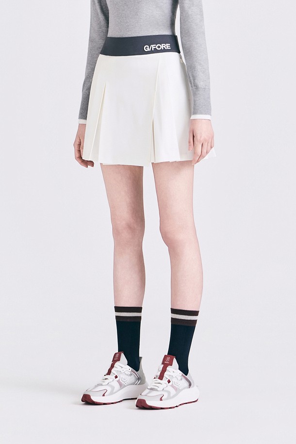 Chân váy golf nữ xếp ly phối viền logo màu ngà — ảnh 3