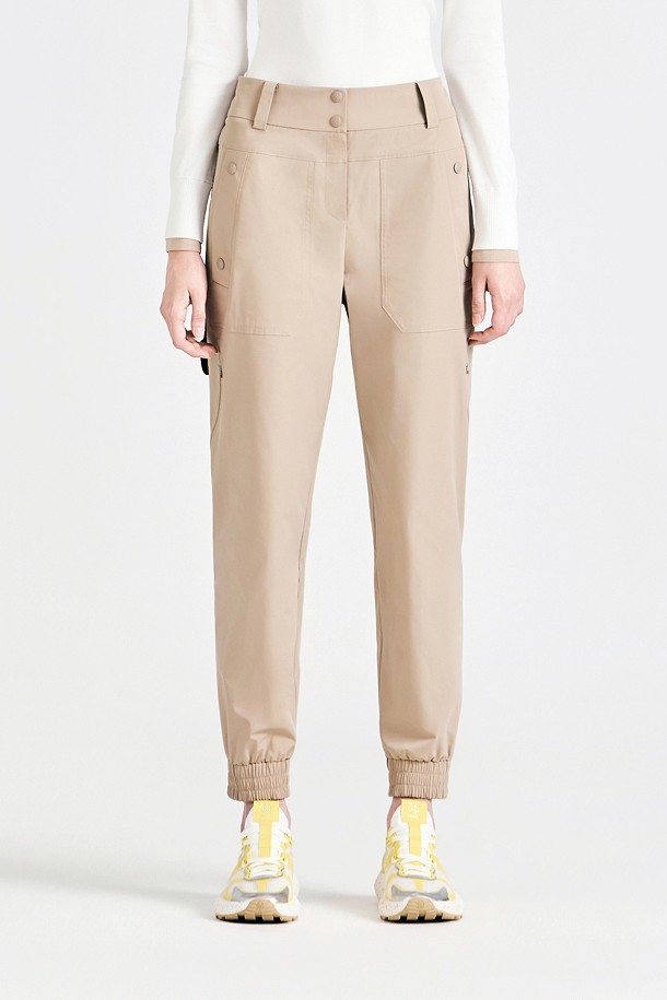 Quần golf nữ dáng jogger màu be của G/FORE, cạp cao, gấu chun
