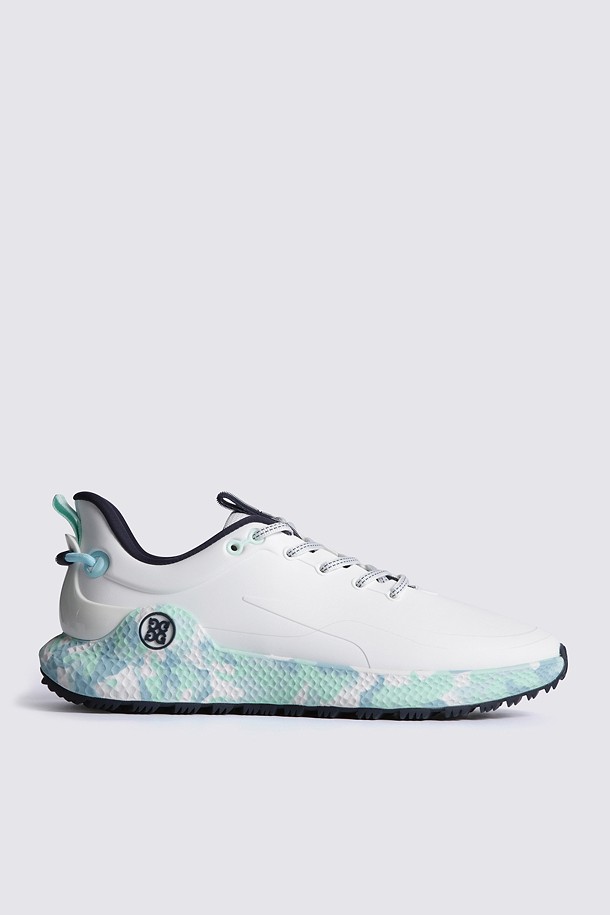 Giày golf nữ trắng G/FORE dáng thể thao, đế họa tiết pastel xanh tím nhẹ nhàng