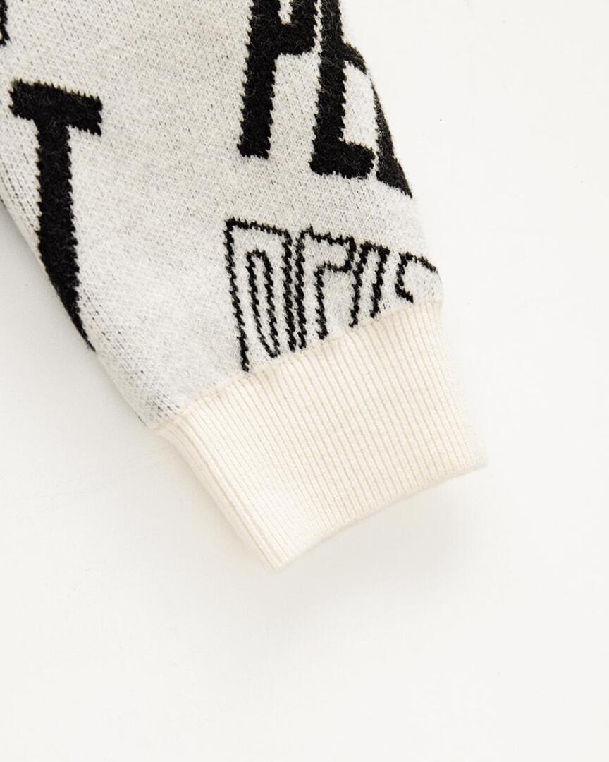 Áo knit golf nữ họa tiết chữ PELT màu ngà — ảnh 5