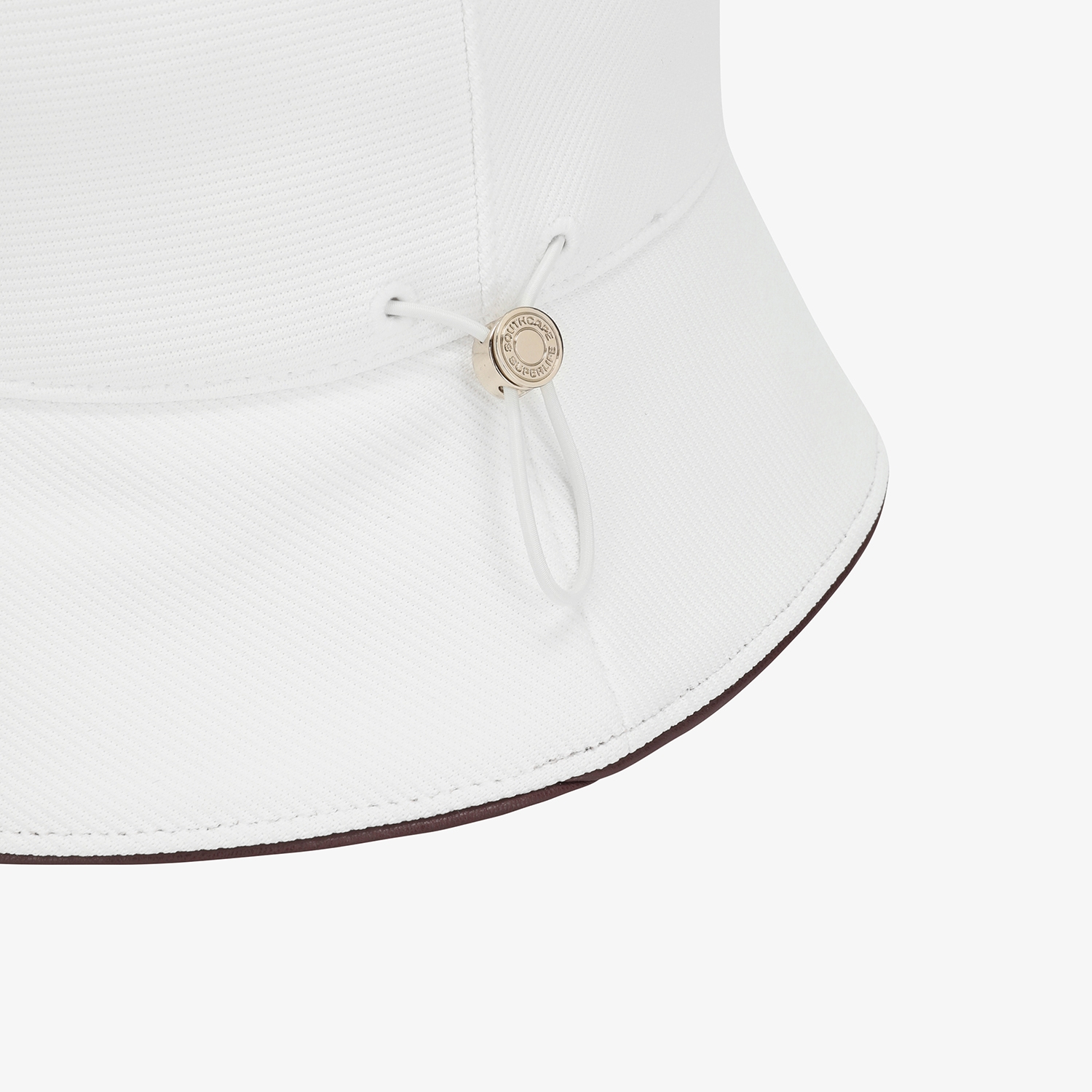 Mũ golf nữ dáng bucket màu trắng chữ nổi nâu — ảnh 6