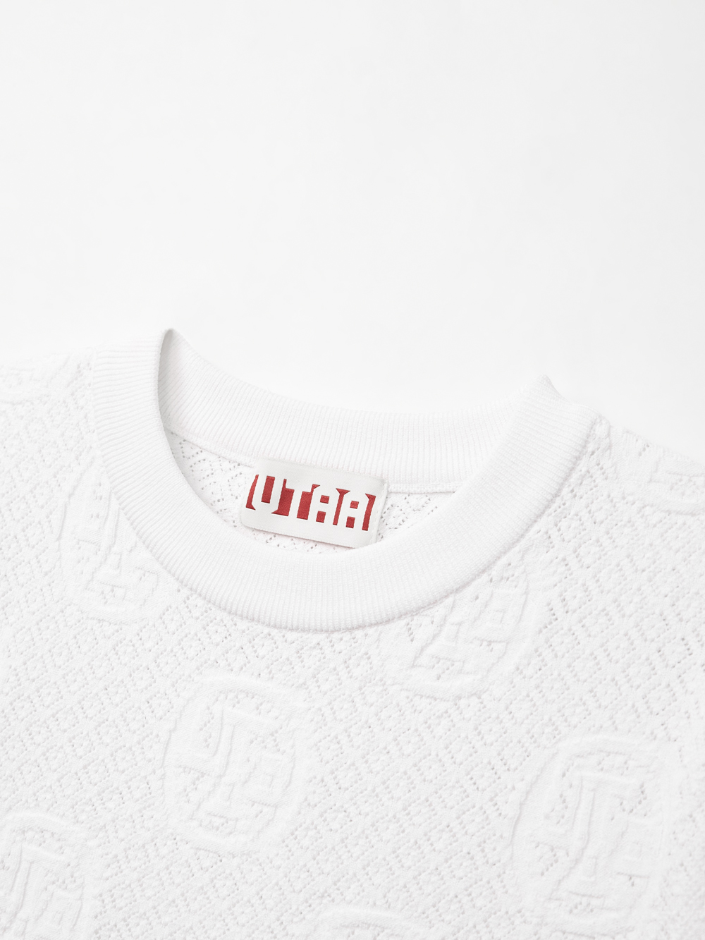Áo knit golf nữ họa tiết nổi màu trắng — ảnh 3
