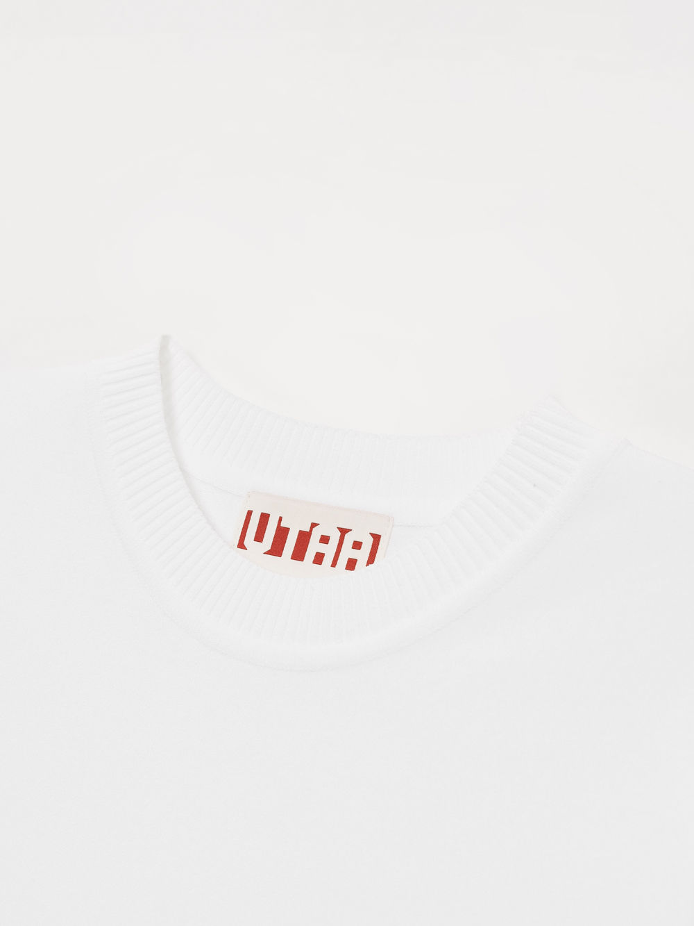 Áo knit golf nữ tay ngắn viền sọc màu trắng — ảnh 3