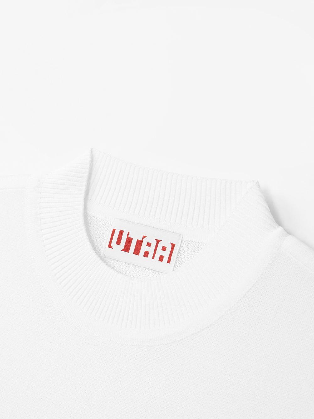Áo knit golf nữ cổ tròn tay ngắn màu trắng — ảnh 3